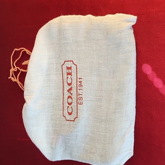 Coach wristlet, size 8"w x 5" - Picture 5 of 5